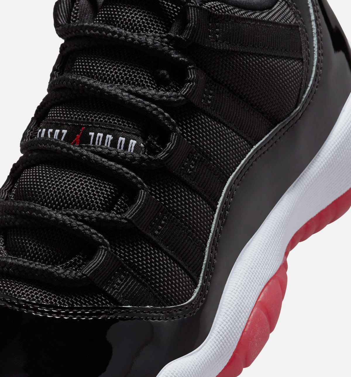 Air Jordan 11 Retro Bred Grade School Lifestyle Shoe – Black / Varsity Red / White